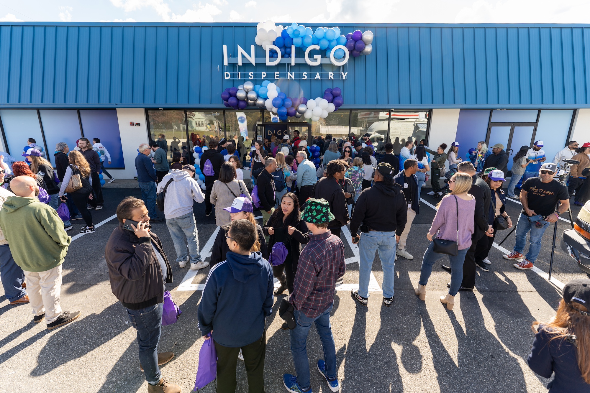 https://www.indigodispensary.com/wp-content/uploads/2023/10/indigo_grand_opening.jpg